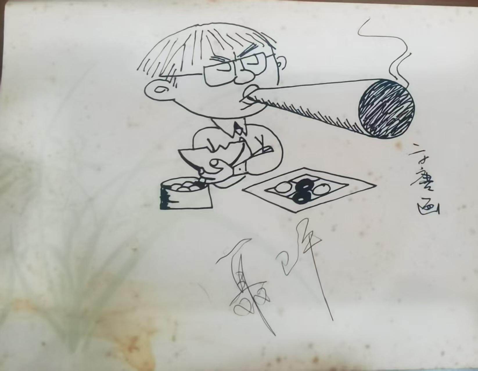 羊城晚报漫画家方唐为聂卫平所作漫画像